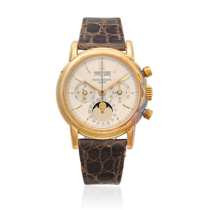 PATEK PHILIPPE. A PHENOMENAL 18K GOLD MANUAL WIND PERPETUAL CALENDAR CHRONOGRAPH WRISTWATCH WITH MOON PHASERef 3970 E, c.1988 image 1