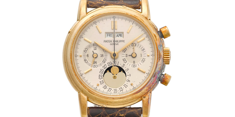 PATEK PHILIPPE. A PHENOMENAL 18K GOLD MANUAL WIND PERPETUAL CALENDAR CHRONOGRAPH WRISTWATCH WITH MOON PHASERef: 3970 E, c.1988