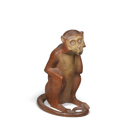 A PAINTED CAST IRON MONKEY DOORSTOP  early 20th century, with original paintheight 8 3/4in (22.3cm) image 1