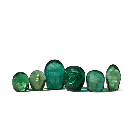 A COLLECTION OF SIX GREEN INTERNALLY DECORATED DUMP GLASS PAPERWEIGHTS height of tallest 5 1/2in (14cm) image 1