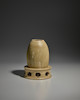 Thumbnail of A GREEN GLAZED STONEWARE MODEL OF A GRANARY Sui dynasty image 1