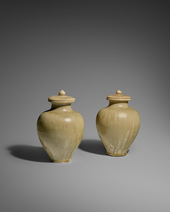 TWO GREEN GLAZED STONEWARE JARS AND COVERS Sui dynasty (2) image 1
