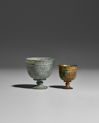 AN ENGRAVED GILT BRONZE STEMCUP AND A POLISHED STONE STEMCUP Tang dynasty (2) image 1