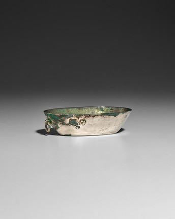 A SMALL OVAL SILVER CUP WITH RING HANDLE Tang dynasty image 1