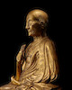 Thumbnail of A GILT COPPER ALLOY REPOUSSÉ FIGURE OF A LAMA  TIBET, CIRCA 18TH CENTURY image 2