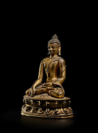 A GILT COPPER ALLOY FIGURE OF BUDDHA  TIBET, 13TH/14TH CENTURY image 2