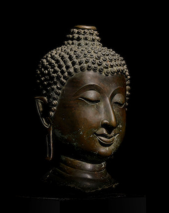 A LARGE COPPER ALLOY HEAD OF BUDDHA NORTHERN THAILAND, LAN NA KINGDOM, 15TH CENTURY image 2