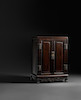 Thumbnail of A ZITAN AND HUANGHUALI SCHOLAR'S DESK CABINET WITH DRAGON APRON, ANTOUGUI Qing Dynasty, 17th/18th century image 6