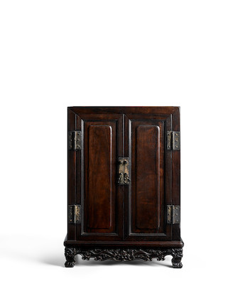 A ZITAN AND HUANGHUALI SCHOLAR'S DESK CABINET WITH DRAGON APRON, ANTOUGUI Qing Dynasty, 17th/18th century image 1