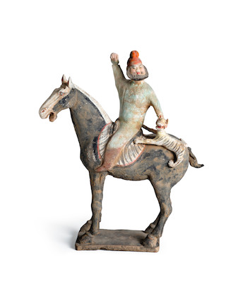A PAINTED POTTERY HORSE AND 'FOREIGNER' RIDER Tang dynasty image 1