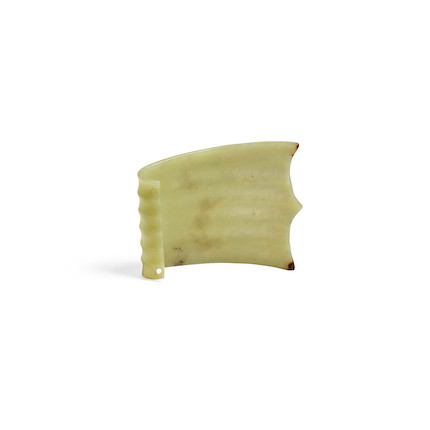 A RARE NEOLITHIC PALE GREEN JADE CURVED AND RIBBED ORNAMENT Hongshan culture, circa 3500-3000 BCE image 1