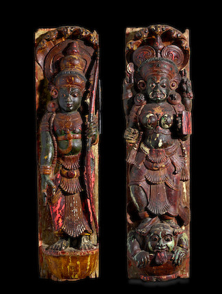 A PAIR OF CARVED POLYCHROME WOOD PANELS OF DEVI KERALA, CIRCA 18TH CENTURY image 1
