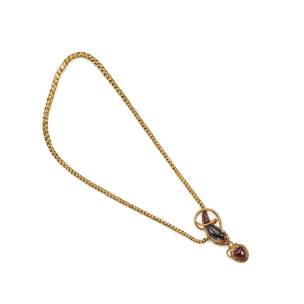 A GOLD, GARNET AND DIAMOND NECKLACE image 1