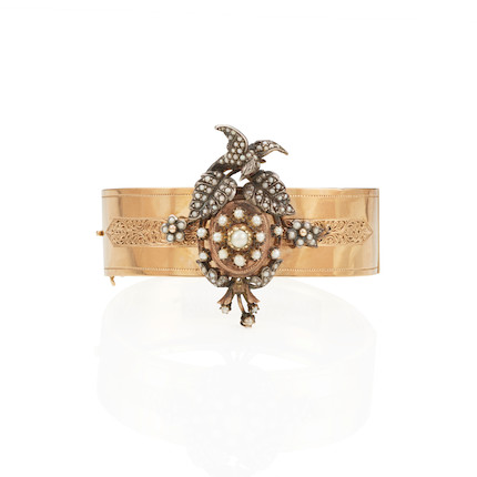 A GOLD, SILVER-TOPPED GOLD, CULTURED PEARL AND RUBY BRACELET image 1