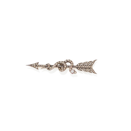 A SILVER-TOPPED GOLD AND DIAMOND ARROW BROOCH image 1