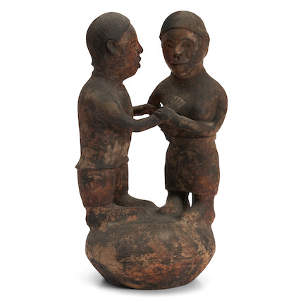 A Voania ceramic sculpture of a couple Voania de Muba ht. 20, wd. 10 in. image 1