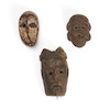 Thumbnail of Three tribal masks ht. 12, wd. 7, ht. 9 1/8, wd. 6 3/4, and ht. 10, wd. 5 1/2 in. image 1