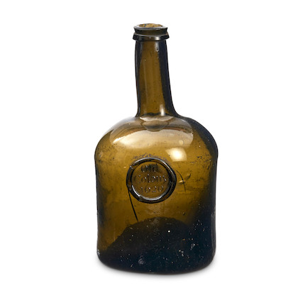 An Important Sealed 'Squat Cylinder' Wine Bottle of Colonial American Interest,  circa 1750-60, dated 1620, image 1