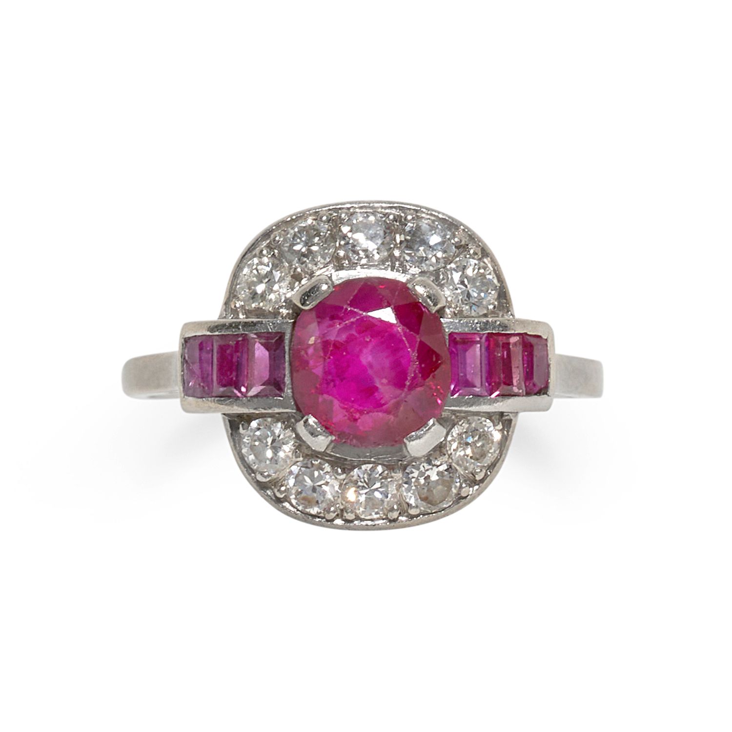 A PLATINUM, RUBY, AND DIAMOND RING, CIRCA 1950s