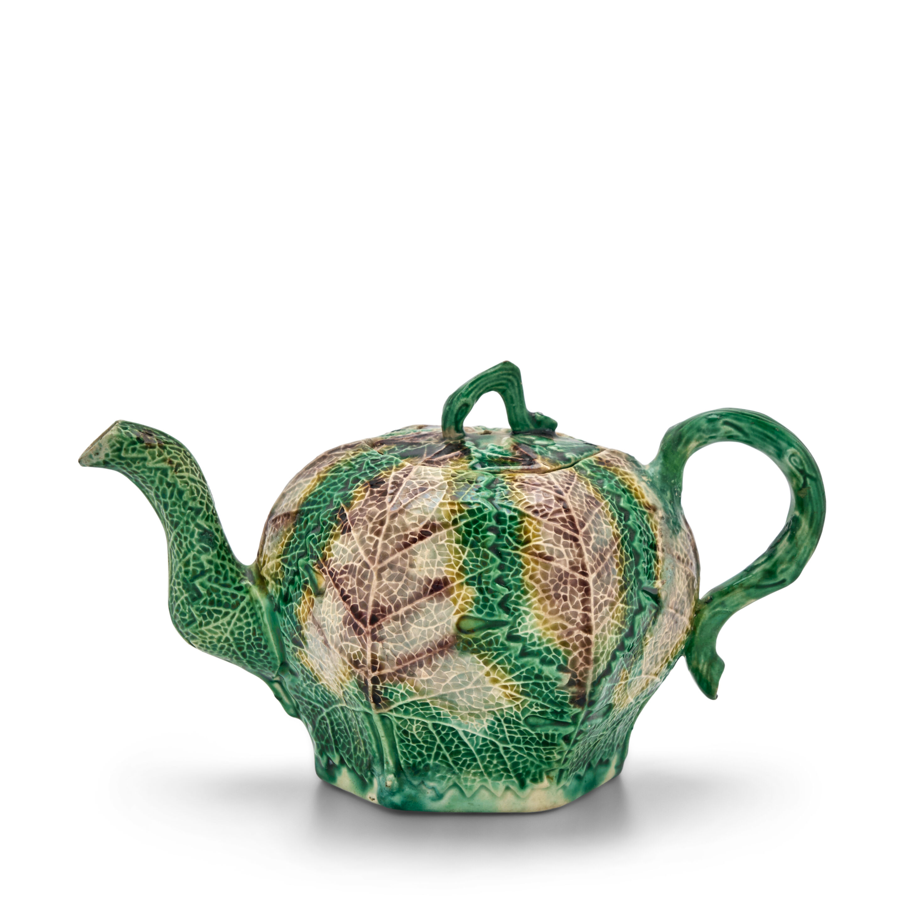 A Staffordshire Lead-glazed Naturalistic Teapot and Cover of Whieldon-type, Circa 1765