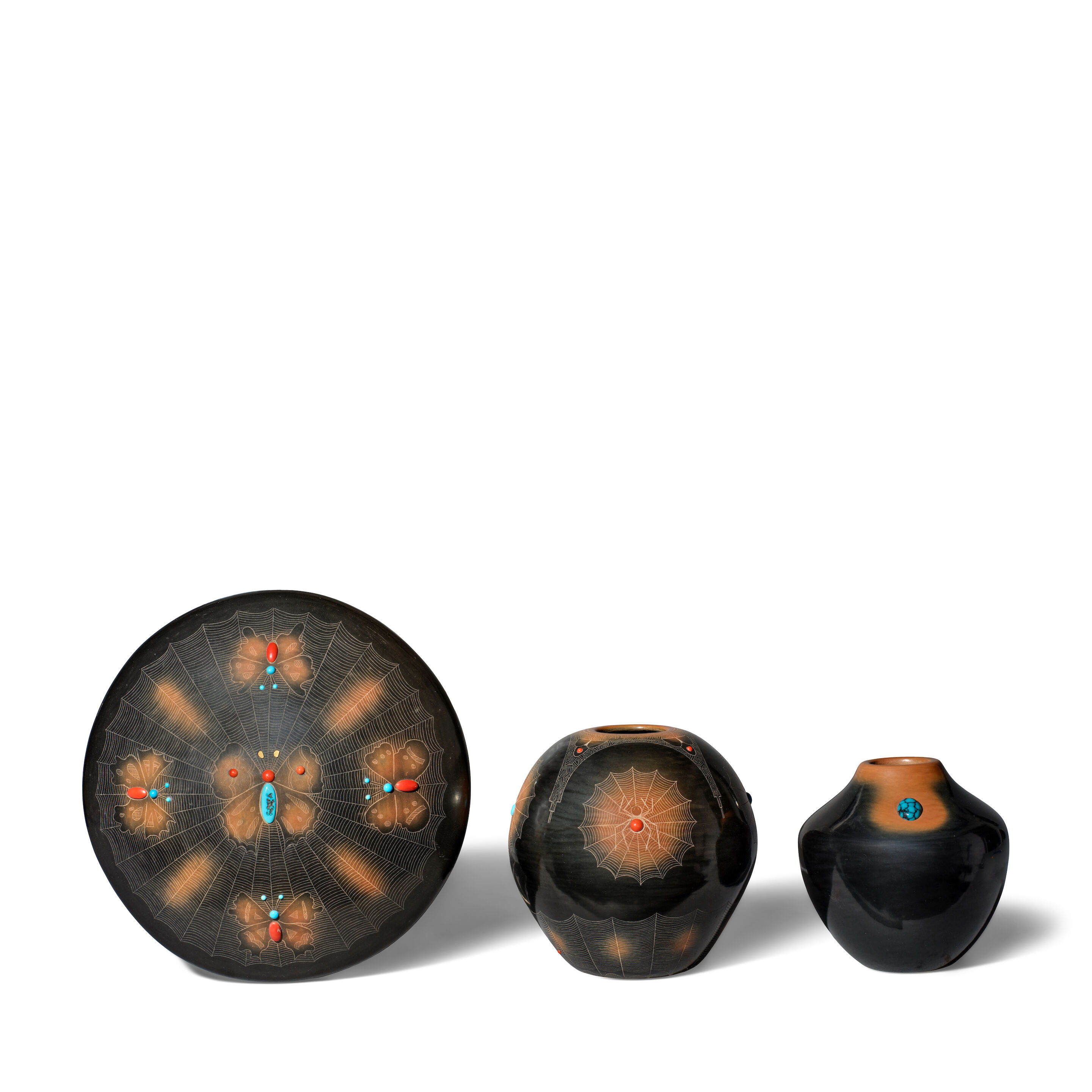 Three San Ildefonso blackware pottery vessels