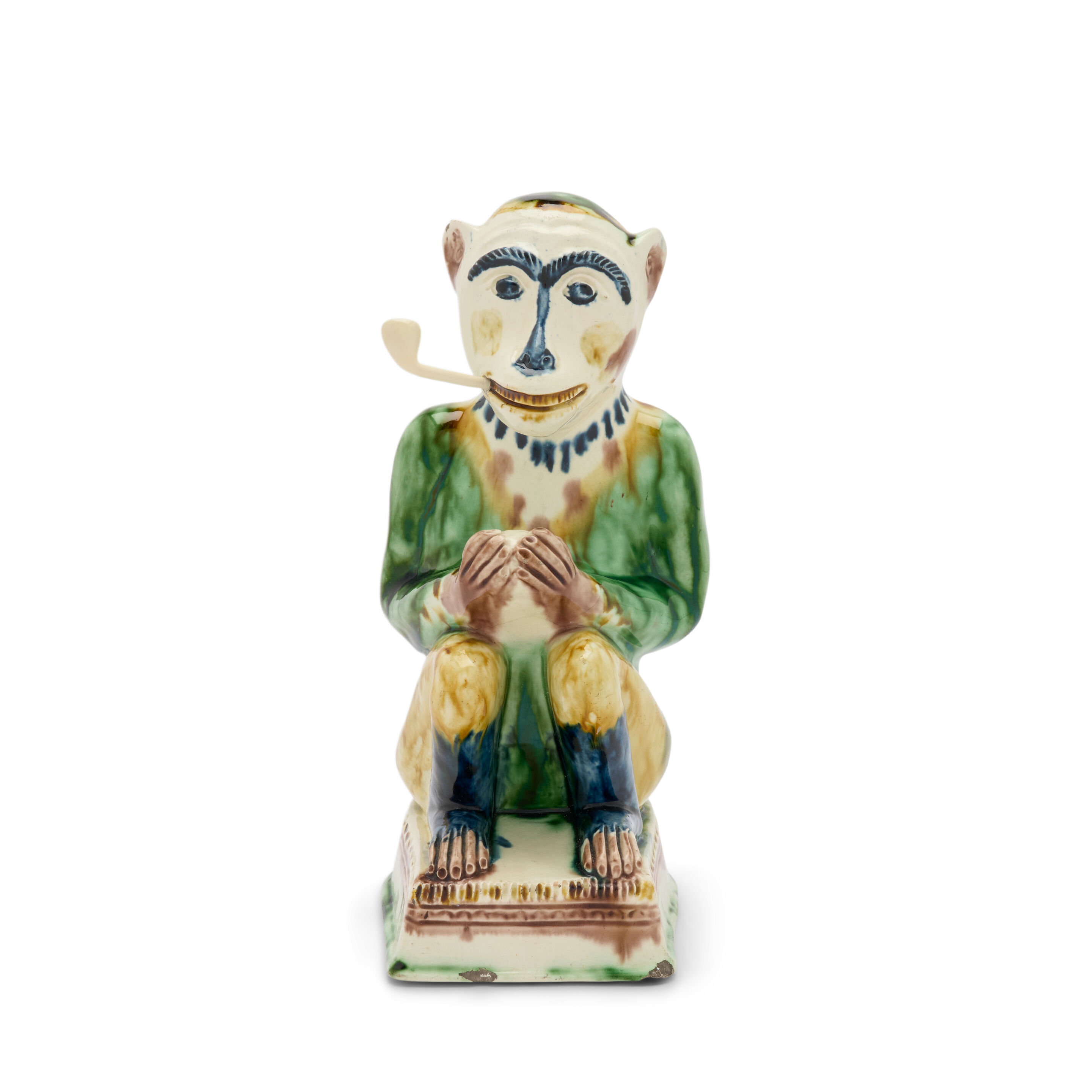 An Amusing Lead-glazed Creamware Model of a Monkey, Late 18th Century