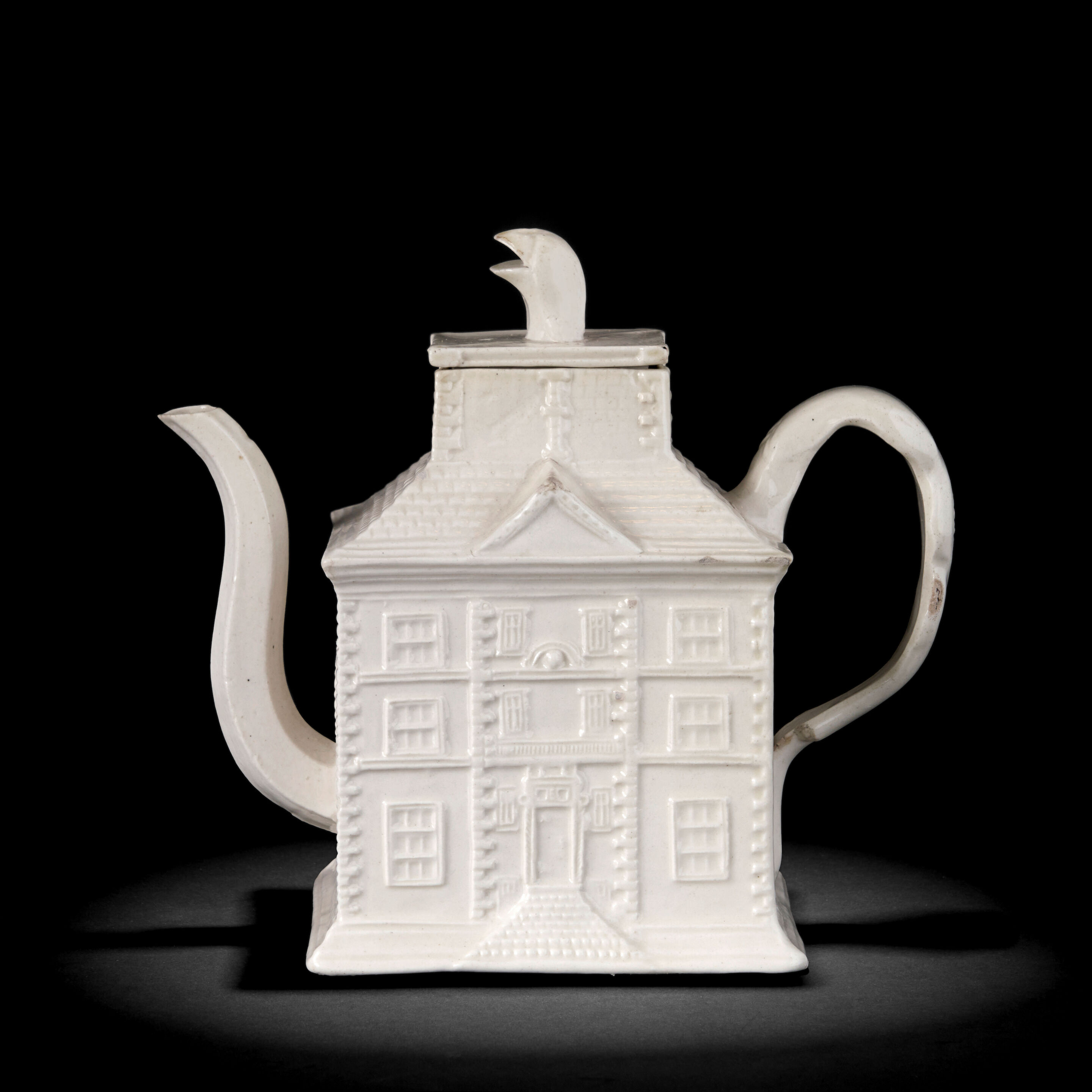 A Staffordshire White Salt-glazed Stoneware Teapot and Cover, Circa 1745
