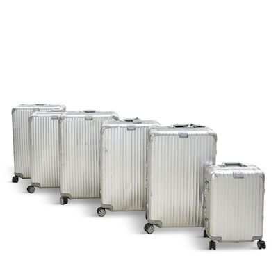 RIMOWA: A SUITE OF SIX ORIGINAL ALUMINUM SUITCASES